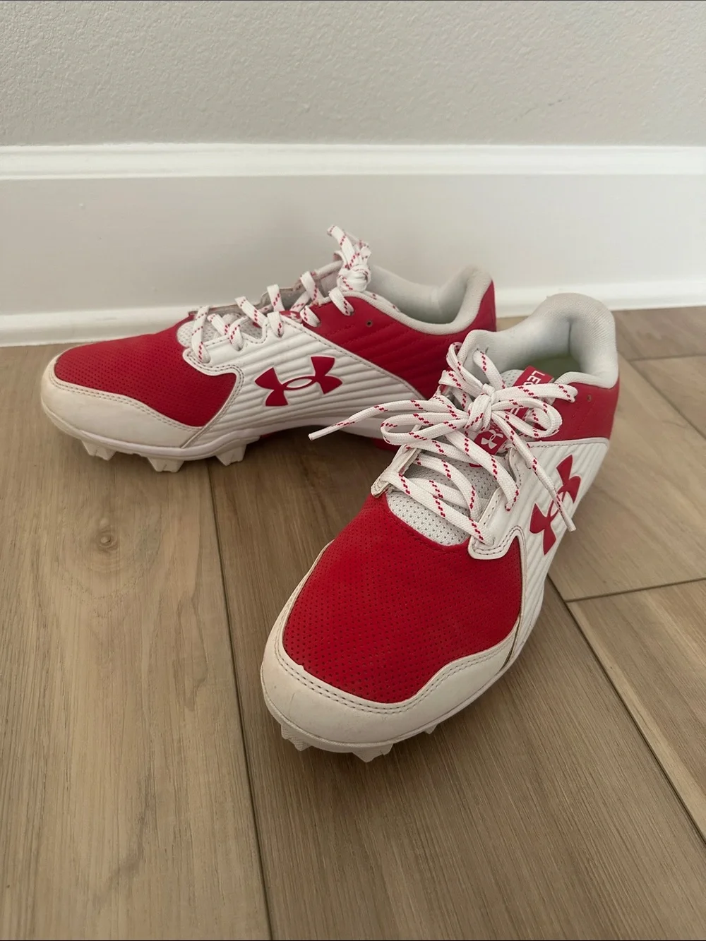 Under Armour Red and White Youth Athletic Cleats